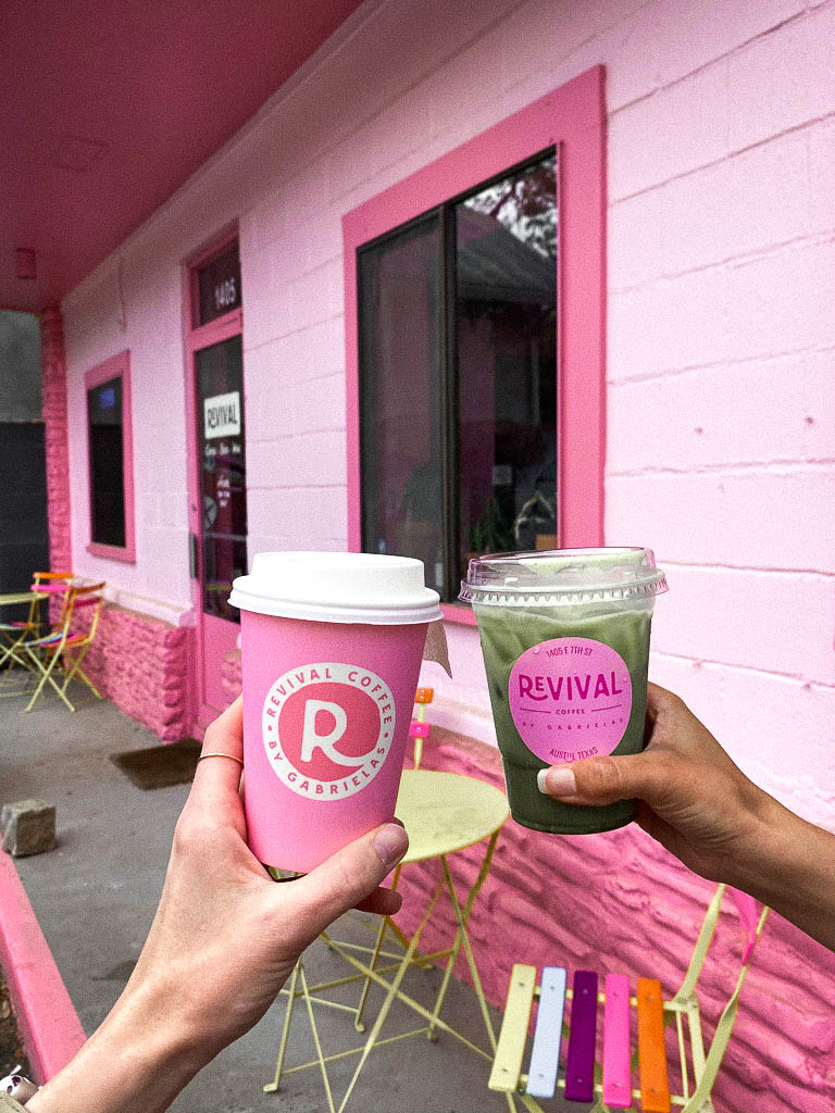 Two coffee drinks outside pink coffee shop in east Austin | Revival Coffee